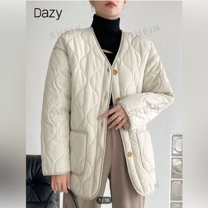 New women’s quilted jacket size small